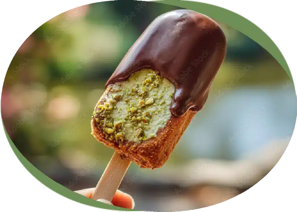 Pistachio butter popsicle coated in chocolate with creamy nut filling — Botenz frozen dessert